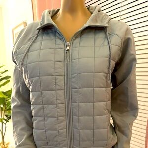 Old Navy zip up fleece jacket with quilted front design.
